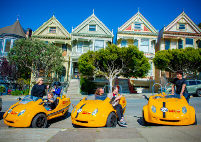 gocars parked in front of the Painted Ladies in San Francisco