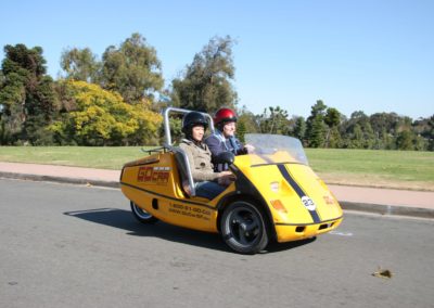 GoCar Driving Past Open Green Space in California
