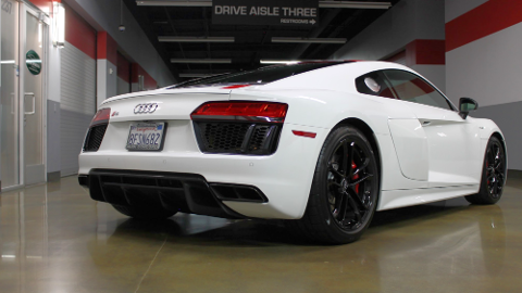 Rear View of an White Audi R8 RWS With a Red Accent