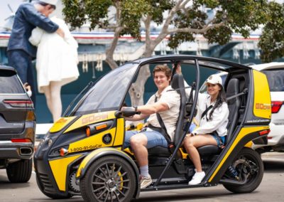 people driving a gocar