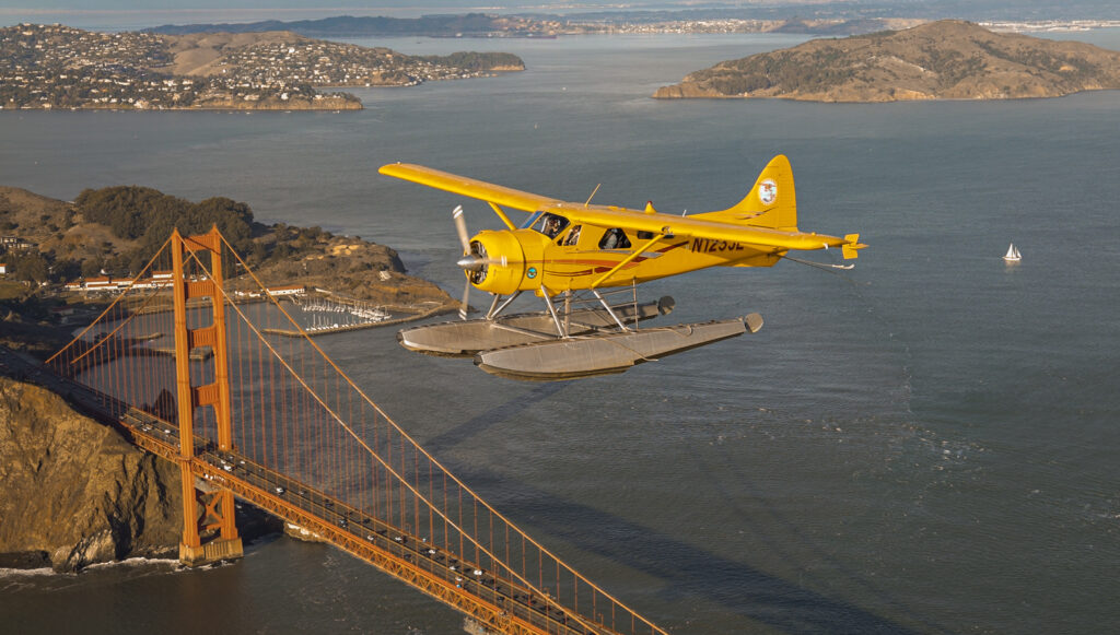 Seaplane flying over the golden gate bridge in San Francisco